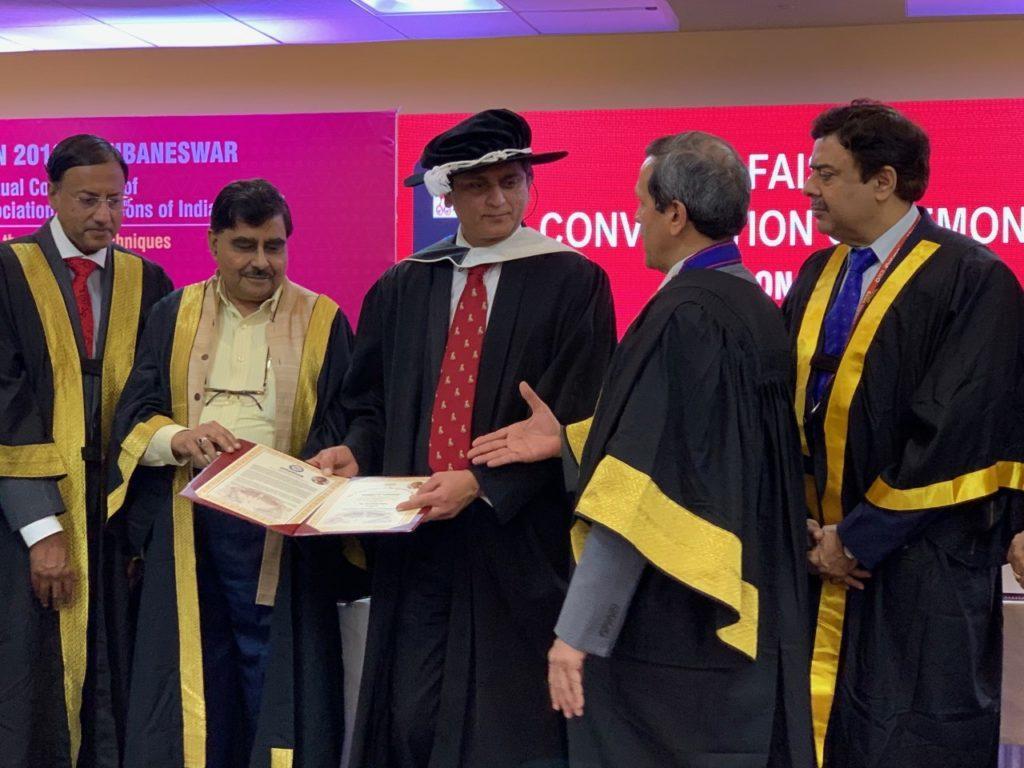 Professor Bijendra Patel receiving the Honorary Fellowship of the Association of Surgeons of India.